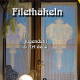 Cover des Buches 'Filethäkeln' mit zwei gehäkelten Vorhängen am Fenster