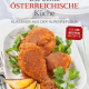 Cover des Buches 'Die echte Österreichische Küche' mit gebackenem Fleisch auf Salat auf einem weißen Teller