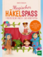 Cover des Buches 'Magischer Häkelspaß' mit fünf gehäkelten Puppen