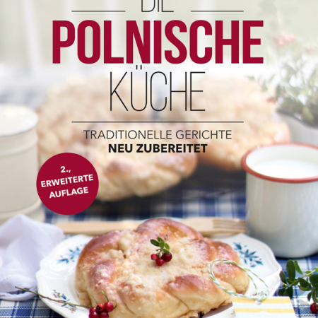 Cover des Buches 'Die polnische Küche' mit polnischer Süßspeise auf einem gedeckten Tisch.
