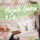 Cover des Buches 'Hirsch, Gams & Co' mit einem Polster und einer Decke mit Hirsch Motiv