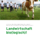 Cover des Buches 'Landwirtschaft (bio)logisch!' mit einer Kuh und mehreren Menschen auf einer Wiese