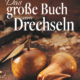 Cover des Buches 'Das große Buch vom Drechseln' mit einem gedrechselten Apfel und Birne aus Holz
