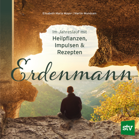 Cover des Buches 'Erdenmann' mit einem Mann der auf einem Felsen sitzt und in die Landschaft blickt