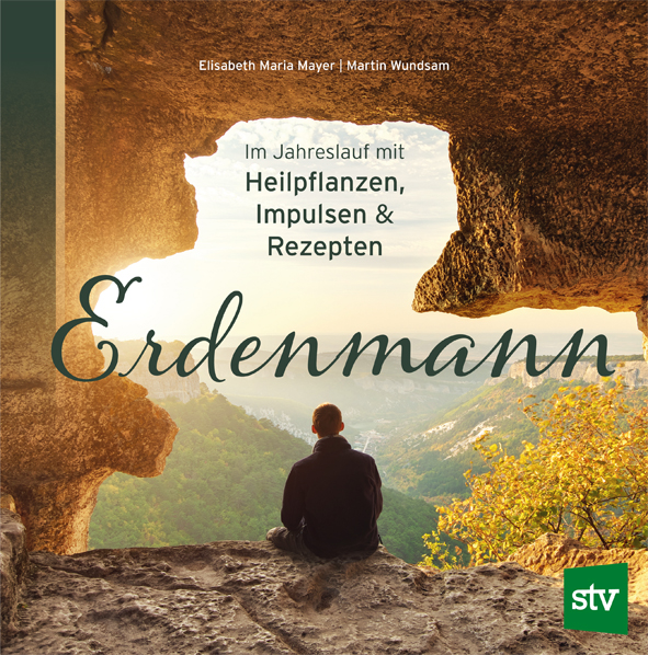 Cover des Buches 'Erdenmann' mit einem Mann der auf einem Felsen sitzt und in die Landschaft blickt