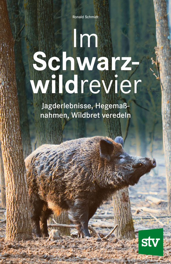 Cover des Buches 'Im Schwarzwildrevier' mit Wildschwein zwischen Bäumen